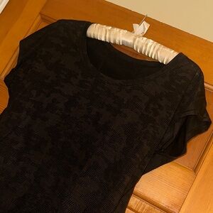 Lululemon Women's Black Short Sleeve top. Black camo design. Like new!